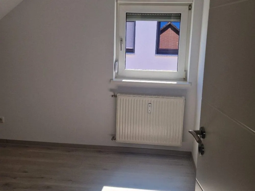 Dachgeschoss Wohnung im dreifamilien Haus