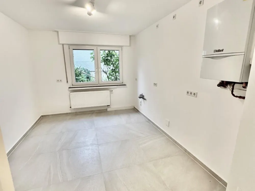 Top sanierte 3 Zimmer Souterrain Wohnung