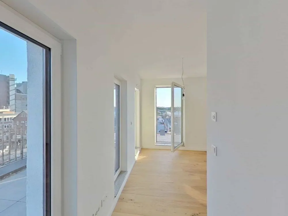 2-Zimmer-Erstbezug 55 m² Wohnfläche davon 29 m² Dachterrasse