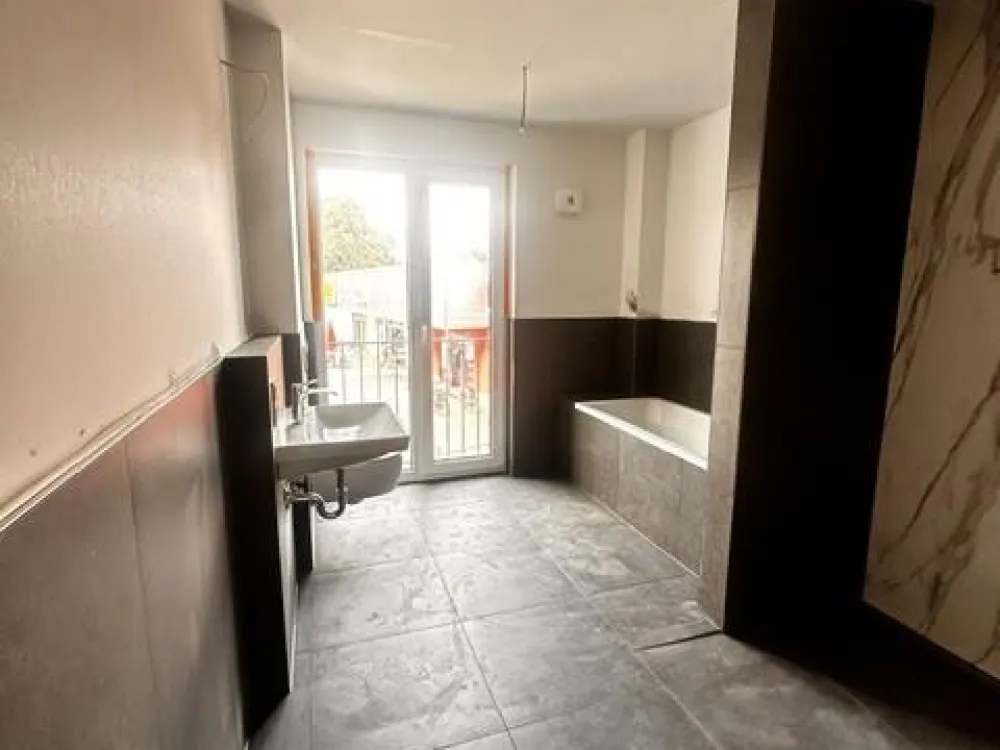 Ihre neue Familienwohnung im Erstbezug mit Balkon.