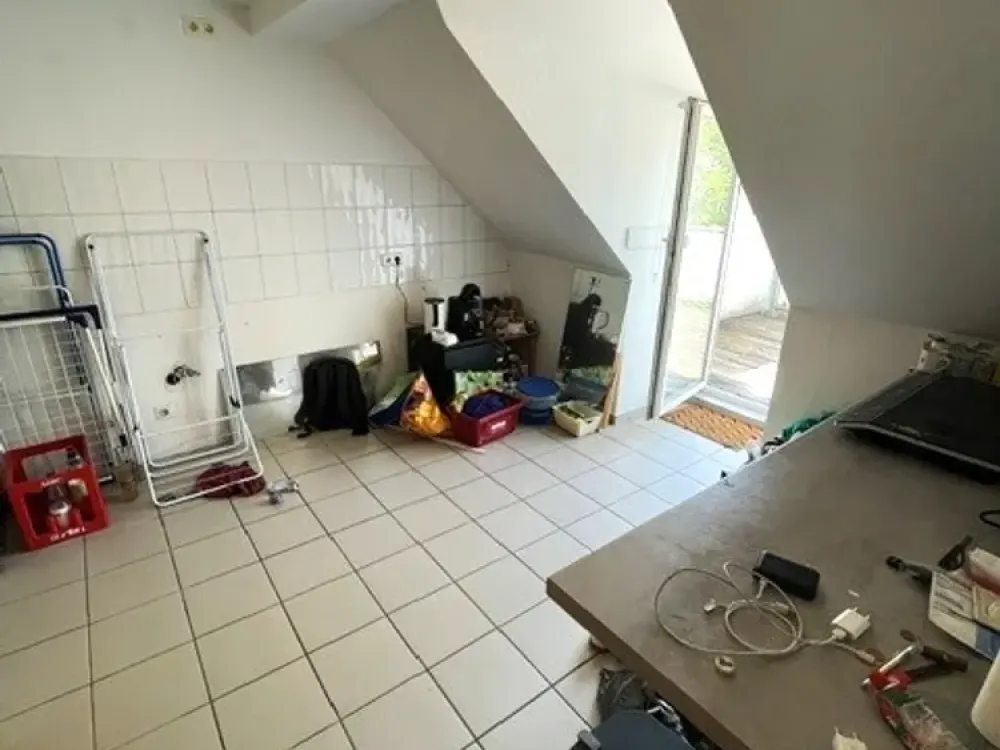 Zentrale 2,5-Zimmer-Dachgeschosswohnung über zwei Ebenen mit Balkon