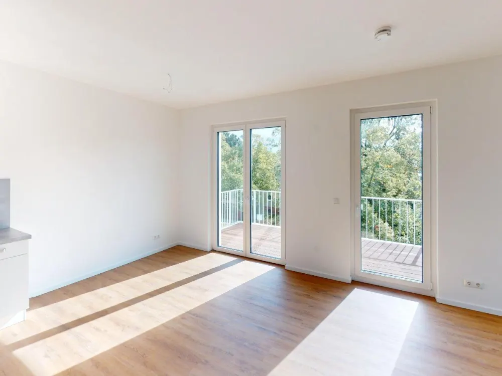 Hochwertige 4-Zimmer Wohnung im 1. OG mit BALKON und EBK im Weißenseer Neubauquartier