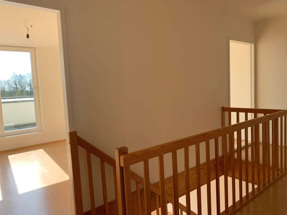 Lichtdurchflutete Maisonettewohnung mit Balkon und Dachterrasse