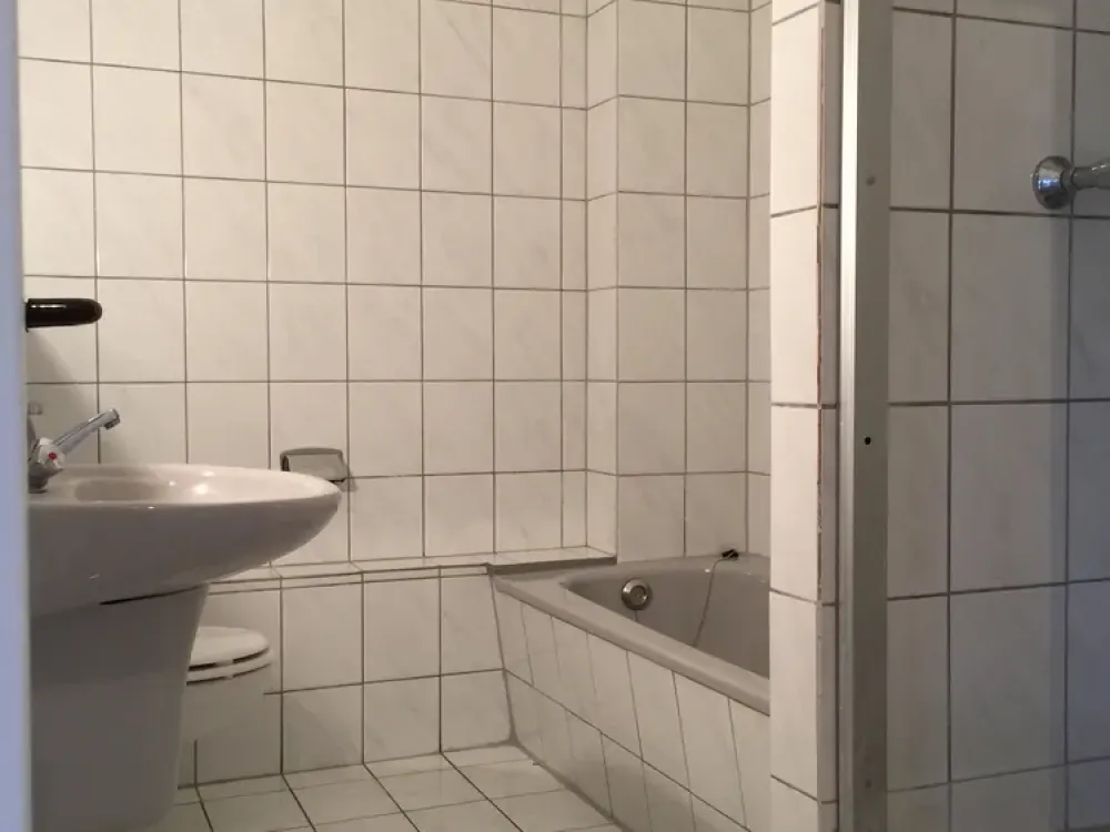 Großzügige DG-Wohnung mit Südbalkon zentral gelegen