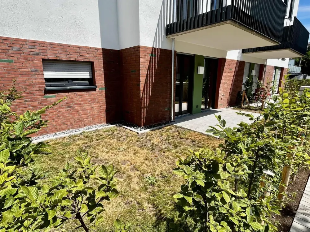 Erstbezug in Frechen: Moderne 3-Zimmer-Wohnung mit Garten und hochwertiger Ausstattung