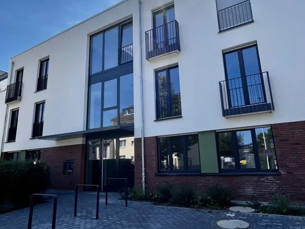 Erstbezug in Frechen: Moderne 3-Zimmer-Wohnung mit Garten und hochwertiger Ausstattung