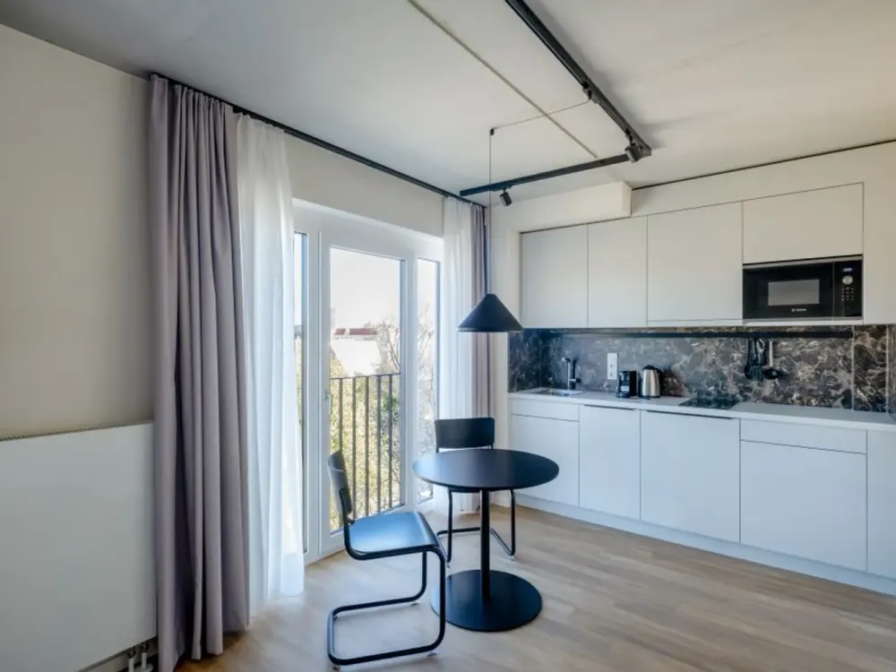 City West Living: Modernes Apartment mit Gym, Coworking & Rooftop am Schloss Charlottenburg