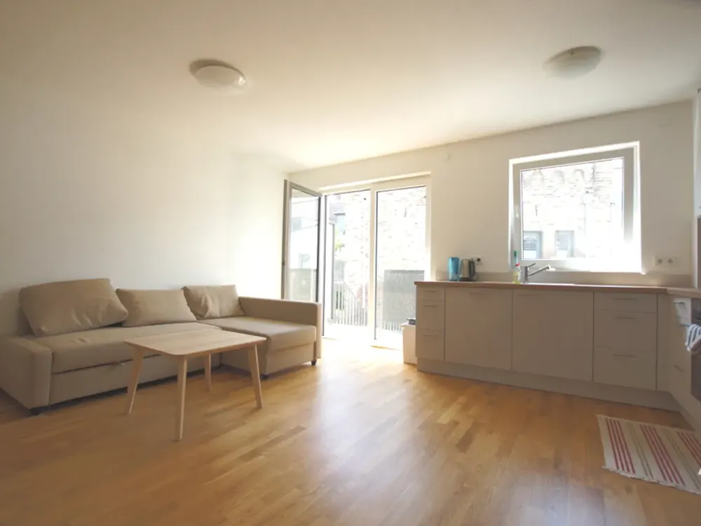 Teilmöblierte 2 Zimmer-Wohnung mit großer Sonnenterrasse, EBK und Tiefgarage in Meerbusch-Büderich