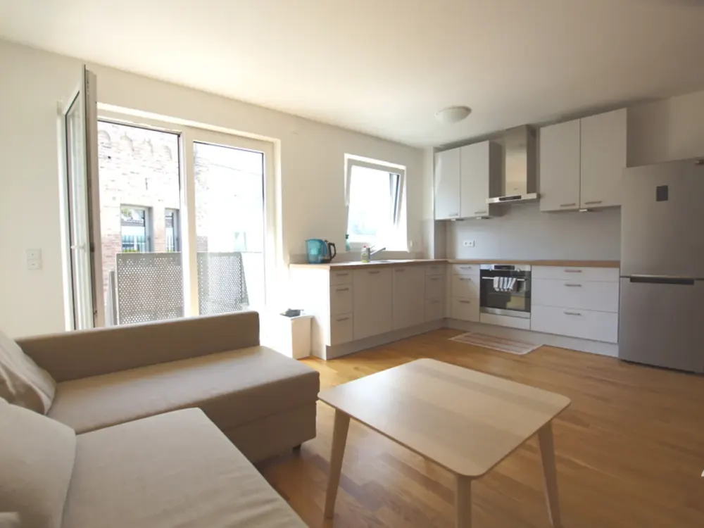 Teilmöblierte 2 Zimmer-Wohnung mit großer Sonnenterrasse, EBK und Tiefgarage in Meerbusch-Büderich