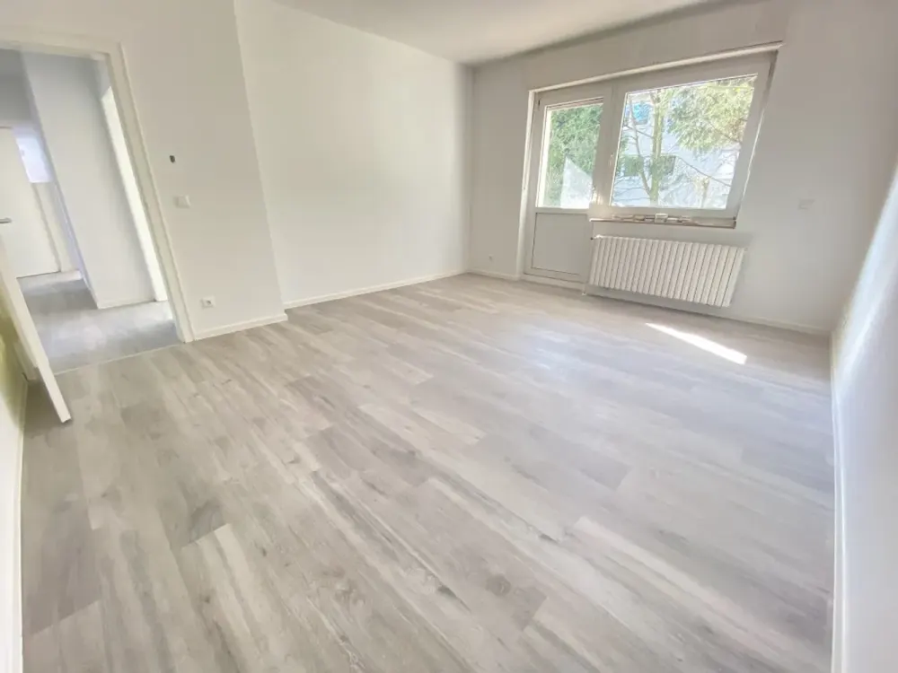 Frisch renovierte Erdgeschosswohnung mit Balkon