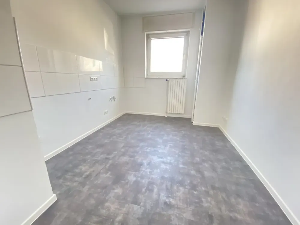 Frisch renovierte Erdgeschosswohnung mit Balkon