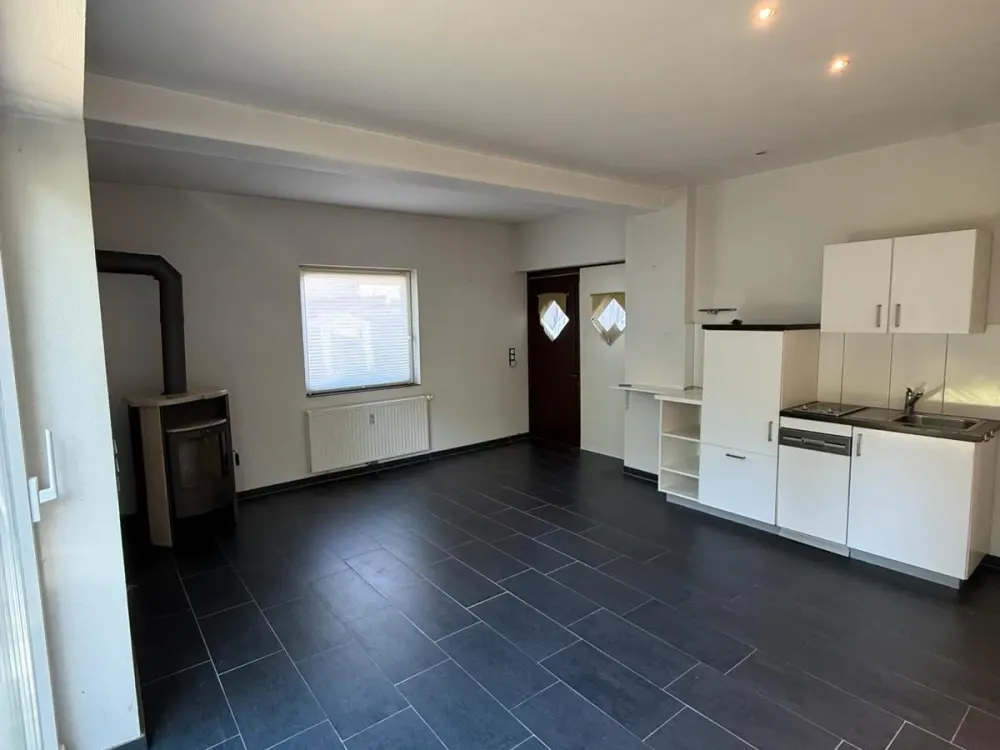 Einzigartige Erdgeschosswohnung mit Garten, Kamin & Doppelgarage