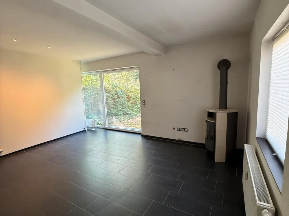 Einzigartige Erdgeschosswohnung mit Garten, Kamin & Doppelgarage