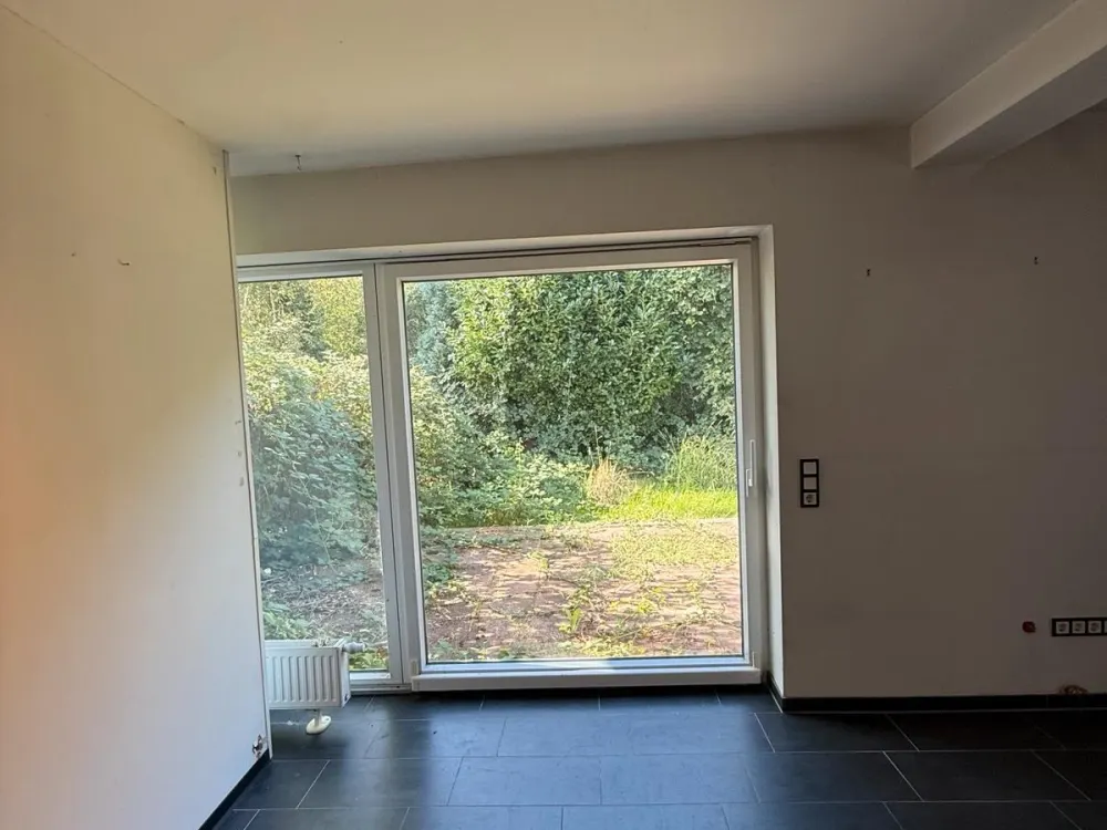 Einzigartige Erdgeschosswohnung mit Garten, Kamin & Doppelgarage