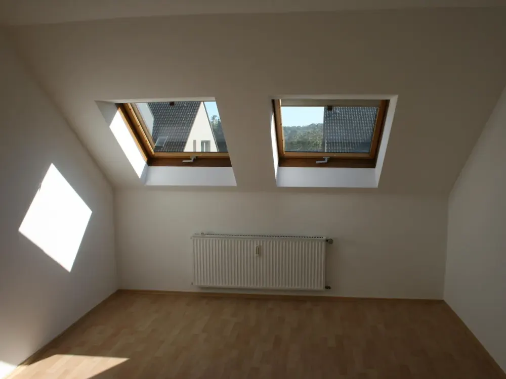 4-Zimmer-DG-Wohnung in MFH