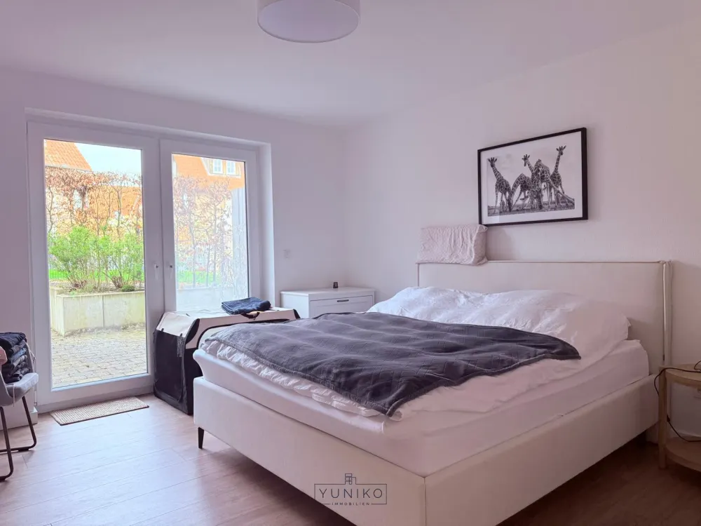 Moderne Erdgeschosswohnung mit großzügigem Wohn-/Essbereich, Terrasse und hochwertiger Einbauküche