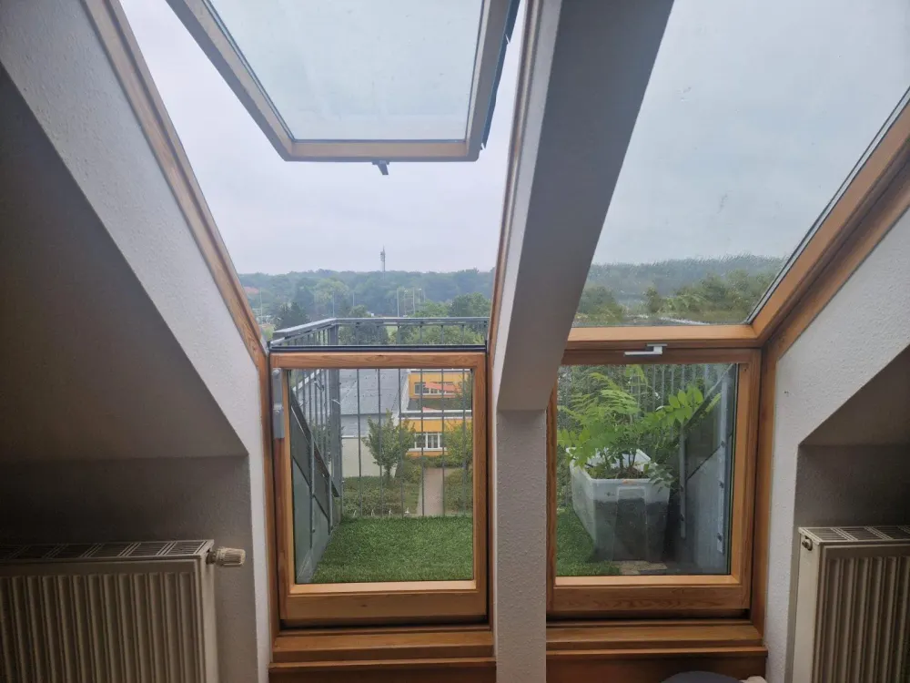 Upscale Attic Apartment with Stunning City Views