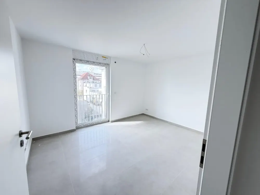 Erstbezug | Helle 3-Zimmer-Neubauwohnung mit Gartenmitbenutzung & Einbauküche