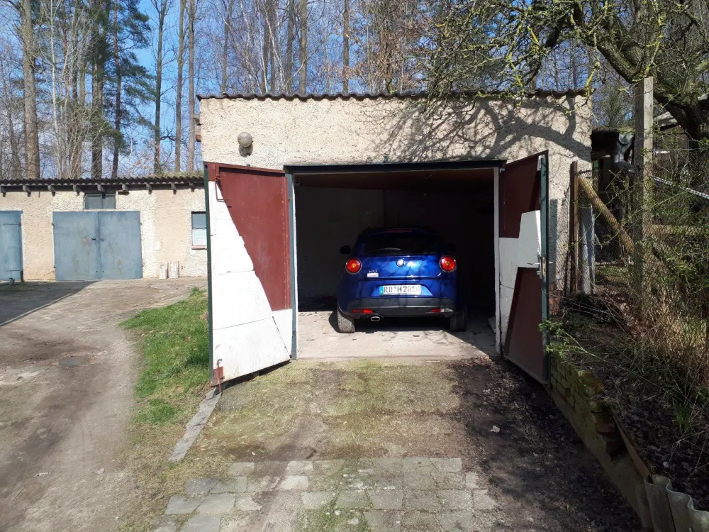 3-Zimmer EG-Wohnung mit großem Garten und Einzelgarage