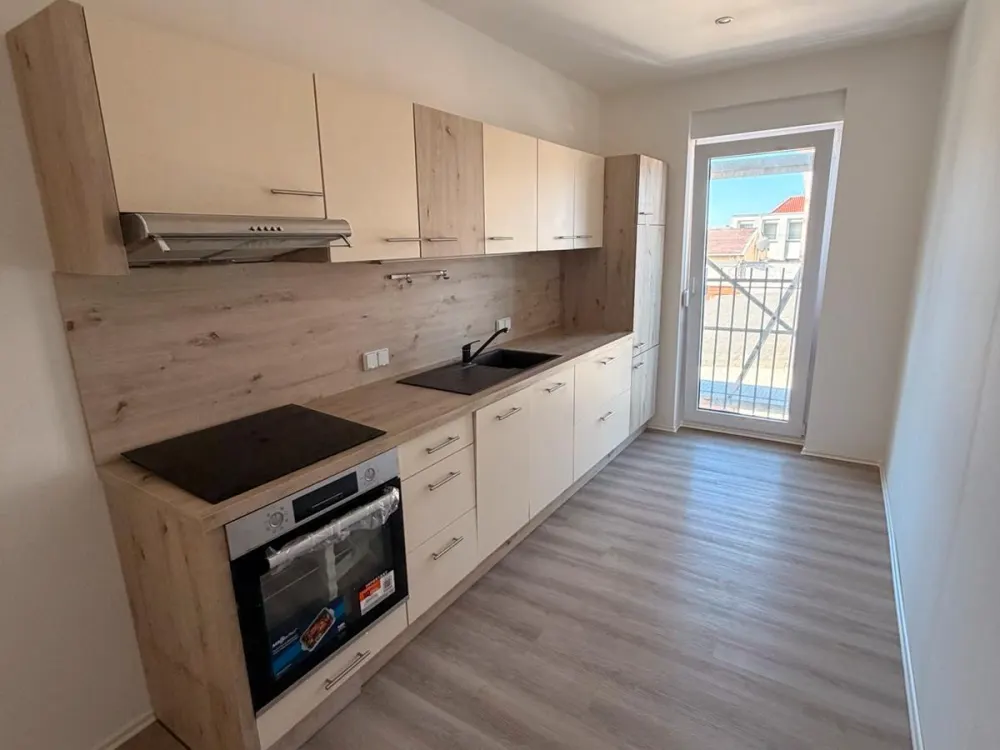 2-Zimmer-Wohnung Holzhausen Balkon Fußbodenheizung Einbauküche