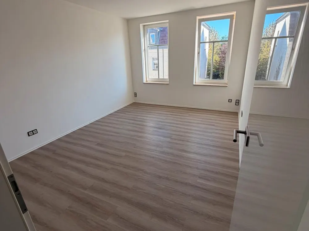 2-Zimmer-Wohnung Holzhausen Balkon Fußbodenheizung Einbauküche