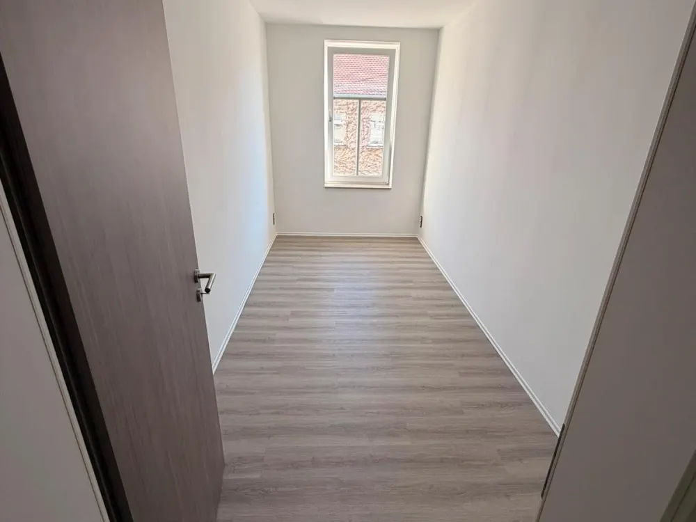 2-Zimmer-Wohnung Holzhausen Balkon Fußbodenheizung Einbauküche