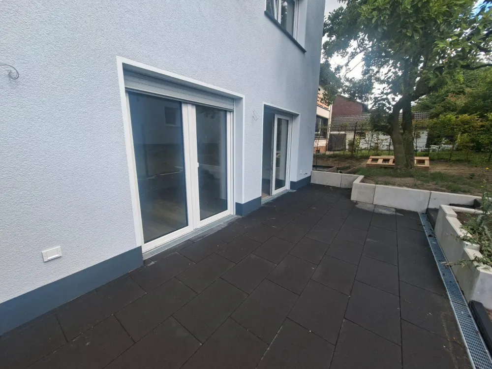 Erdgeschosswohnung mit Südterrasse und eigenem Gartenbereich