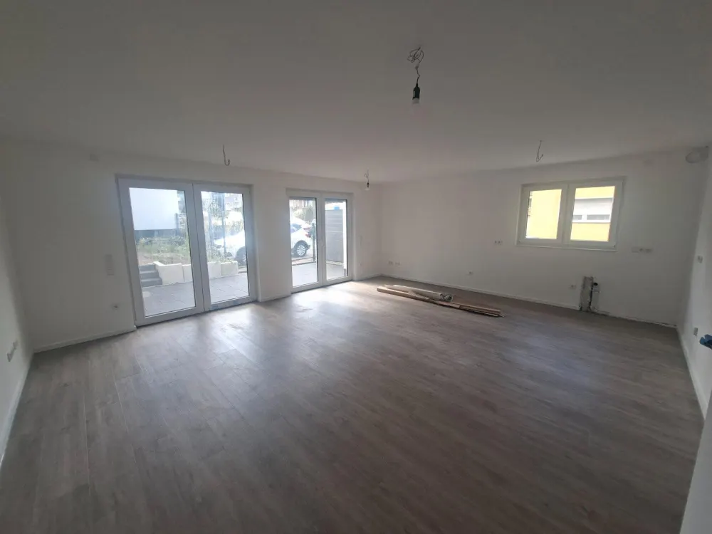 Erdgeschosswohnung mit Südterrasse und eigenem Gartenbereich