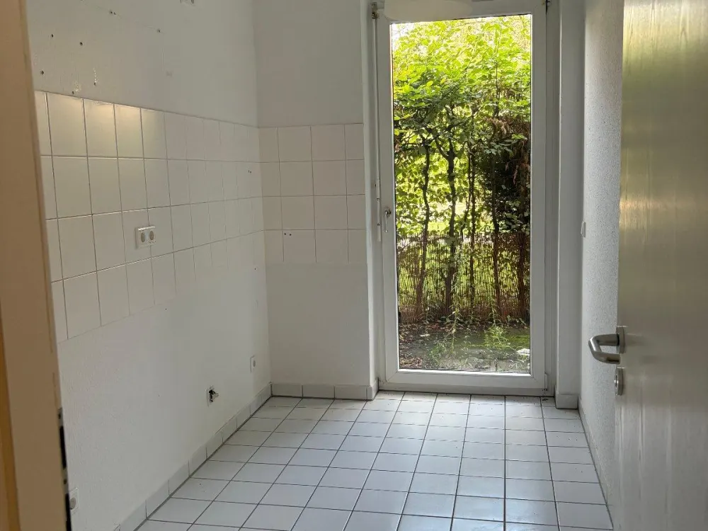 Ruhige 2 Zimmer Wohnung mit Gartenterasse und KFZ- Einstellplatz