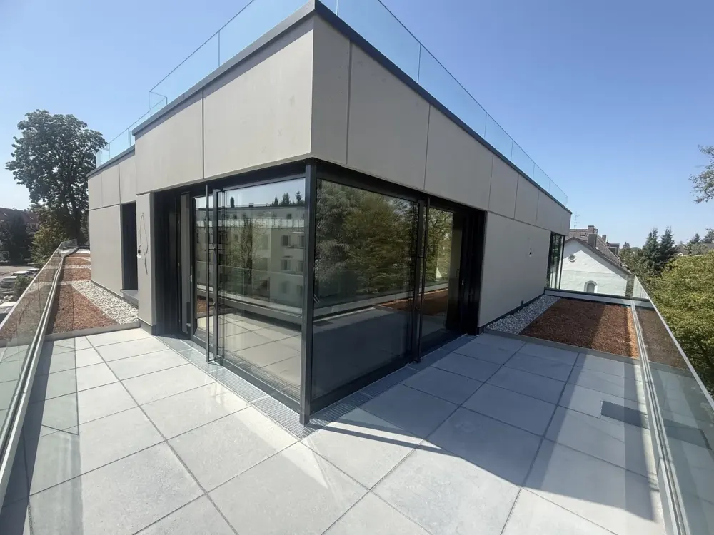 Dreamlike Penthouse Apartment with Fantastic View over the Roofs and Gardens of Laim