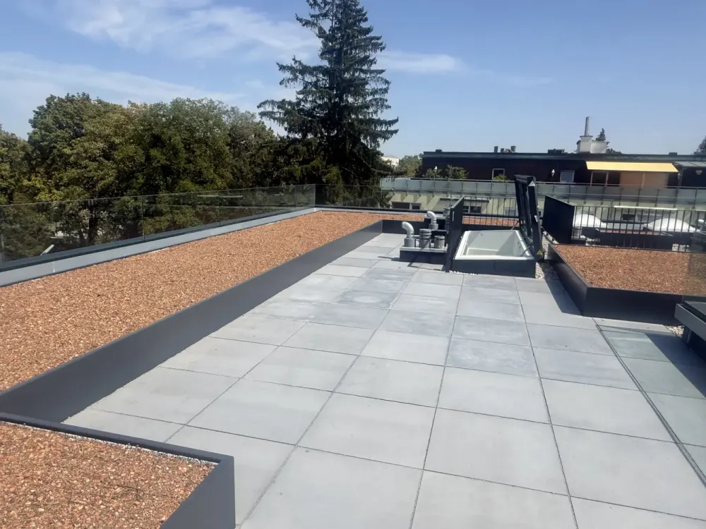 Dreamlike Penthouse Apartment with Fantastic View over the Roofs and Gardens of Laim