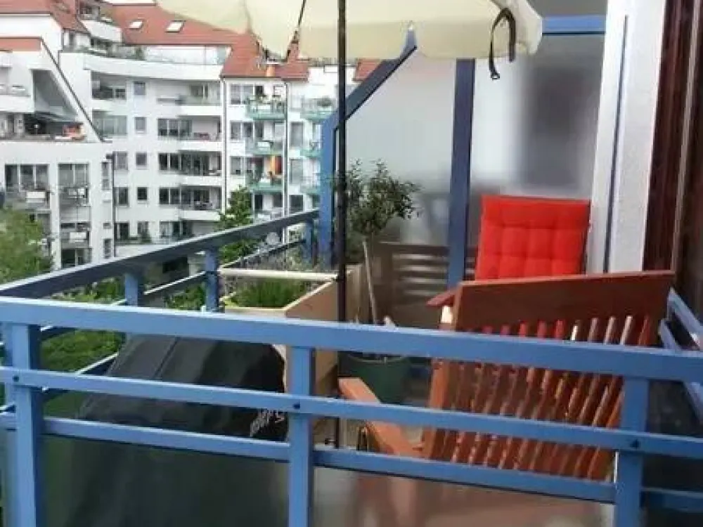 The apartment is located on the 4th floor of a multi-family house with an elevator