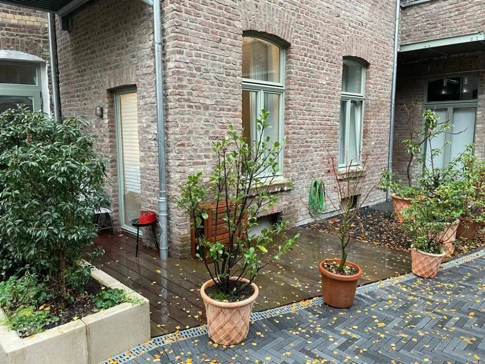 Modernes 1-Zimmer Appartement mit Terrasse im Innenhof