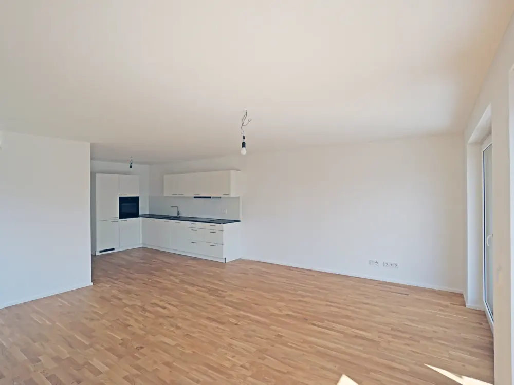 Erstbezug: Licht, Raum und Neubaukomfort, stilvolle 3-Zimmer-Wohnung mit großzügigem Südbalkon