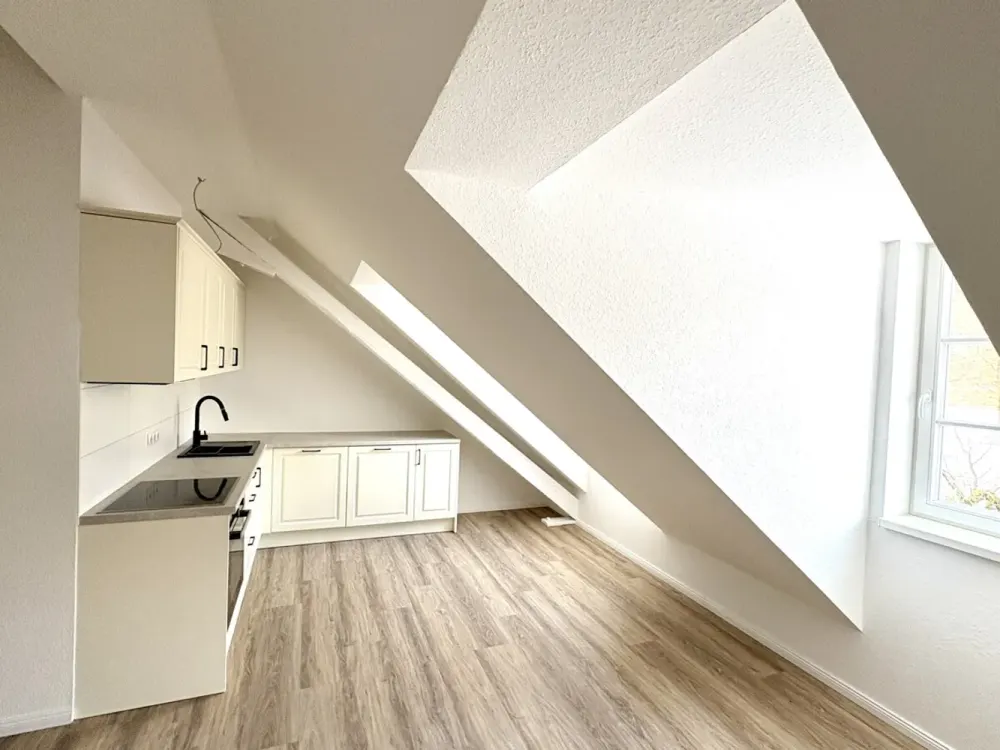Außergewöhnliche Dachgeschosswohnung- Erstbezug !