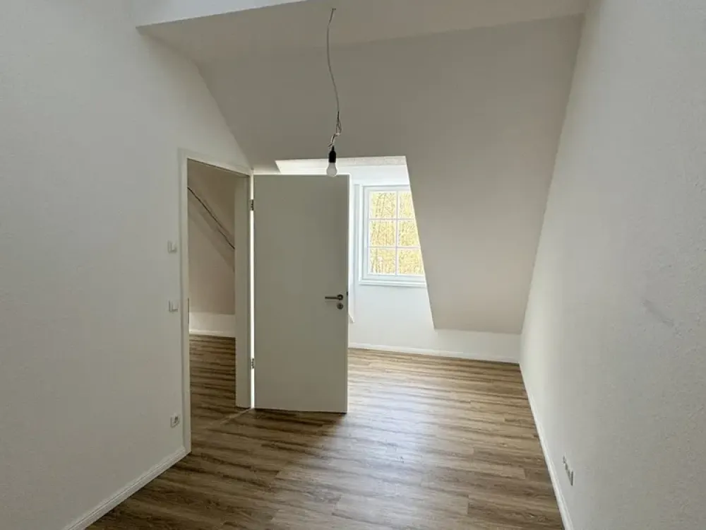 Außergewöhnliche Dachgeschosswohnung- Erstbezug !