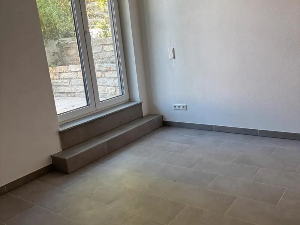 3,5 Zimmerwohnung mit schöner Terasse und Gartenanteil