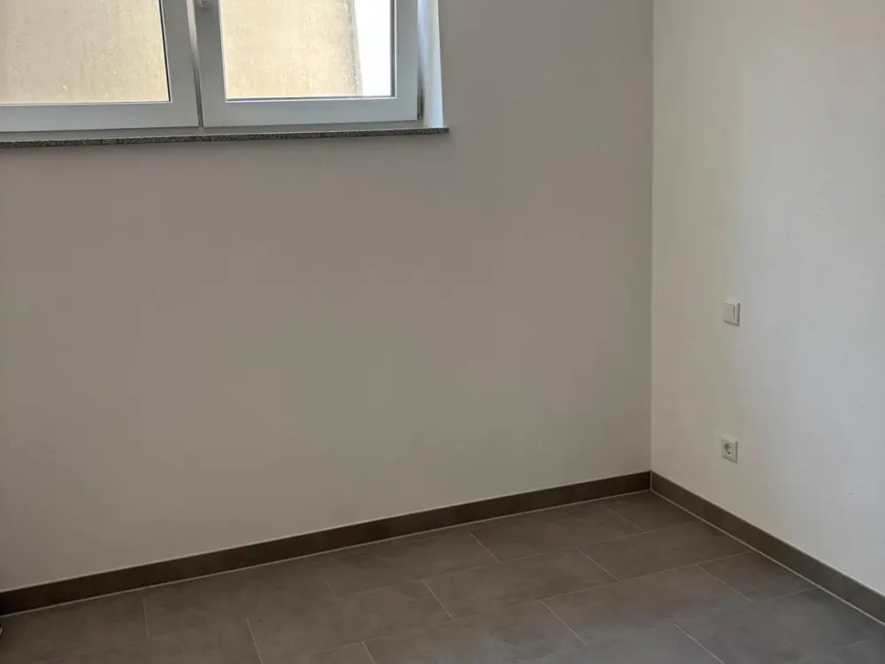 3,5 Zimmerwohnung mit schöner Terasse und Gartenanteil