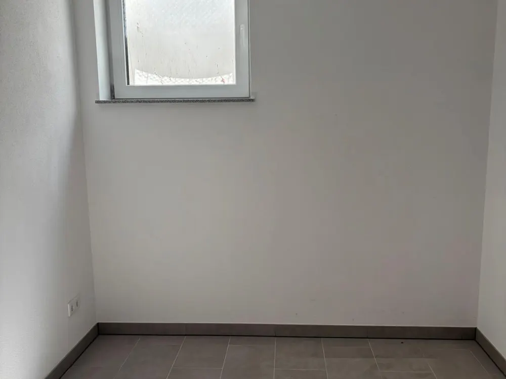 3,5 Zimmerwohnung mit schöner Terasse und Gartenanteil