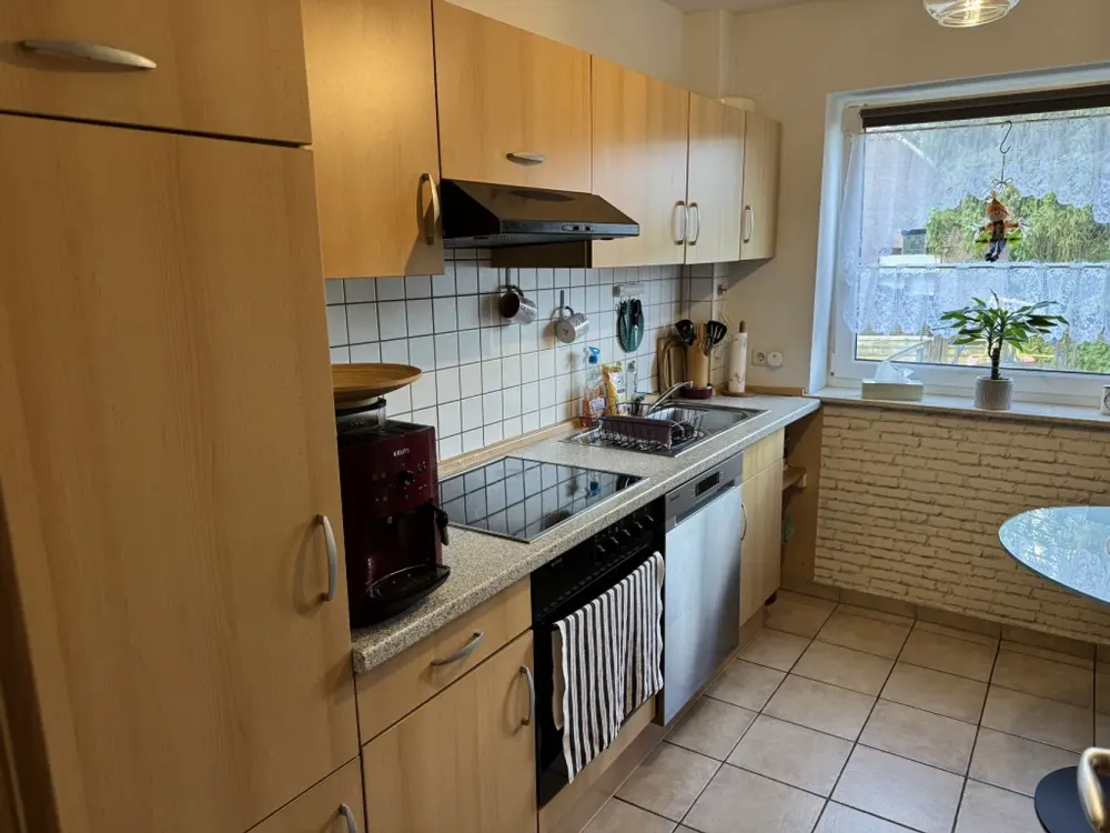 2-Zimmer-Wohnung im Hochparterre mit Balkon und Gartenanteil