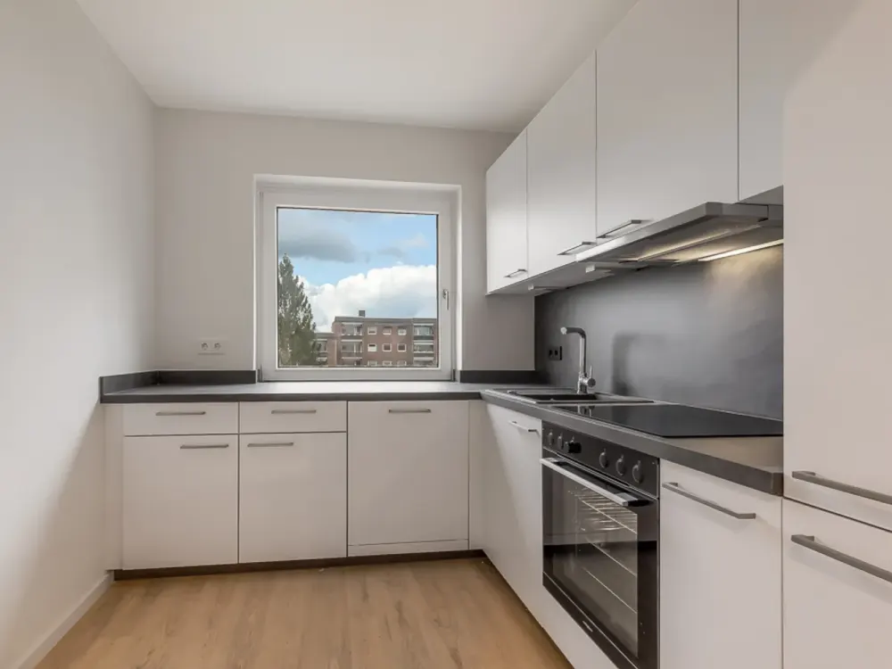 3-Zimmer, Einbauküche, Balkon, Bad mit Fenster und Tiefgaragenstellplatz in Quickborn