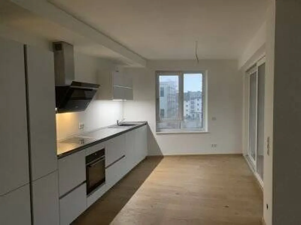 Neubauwohnung mit Balkon, Einbauküche und Tiefgaragenstellplatz im Vorderen Westen - Ein tolles neues Zuhause!