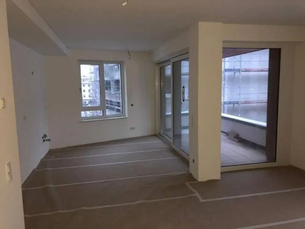 Neubauwohnung mit Balkon, Einbauküche und Tiefgaragenstellplatz im Vorderen Westen - Ein tolles neues Zuhause!