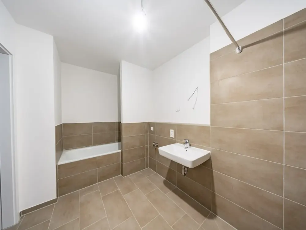 Neubauwohnung im Erstbezug mit Fußbodenheizung und Balkon