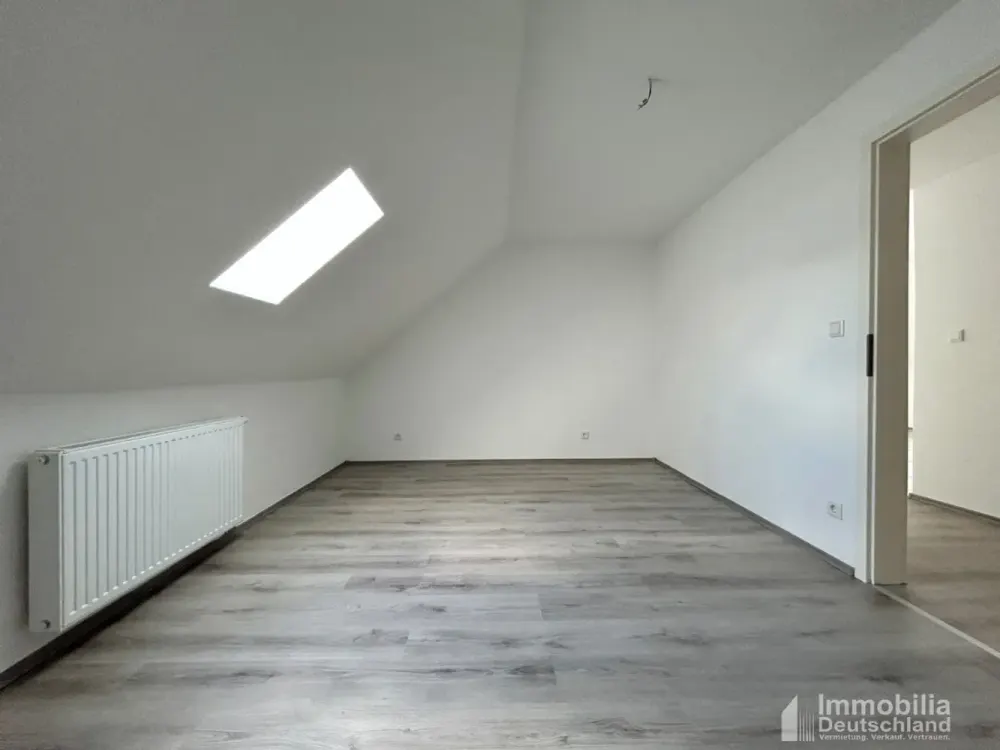 Erstbezug: Moderne 2-Zimmer-Dachgeschosswohnung mit offener Küche