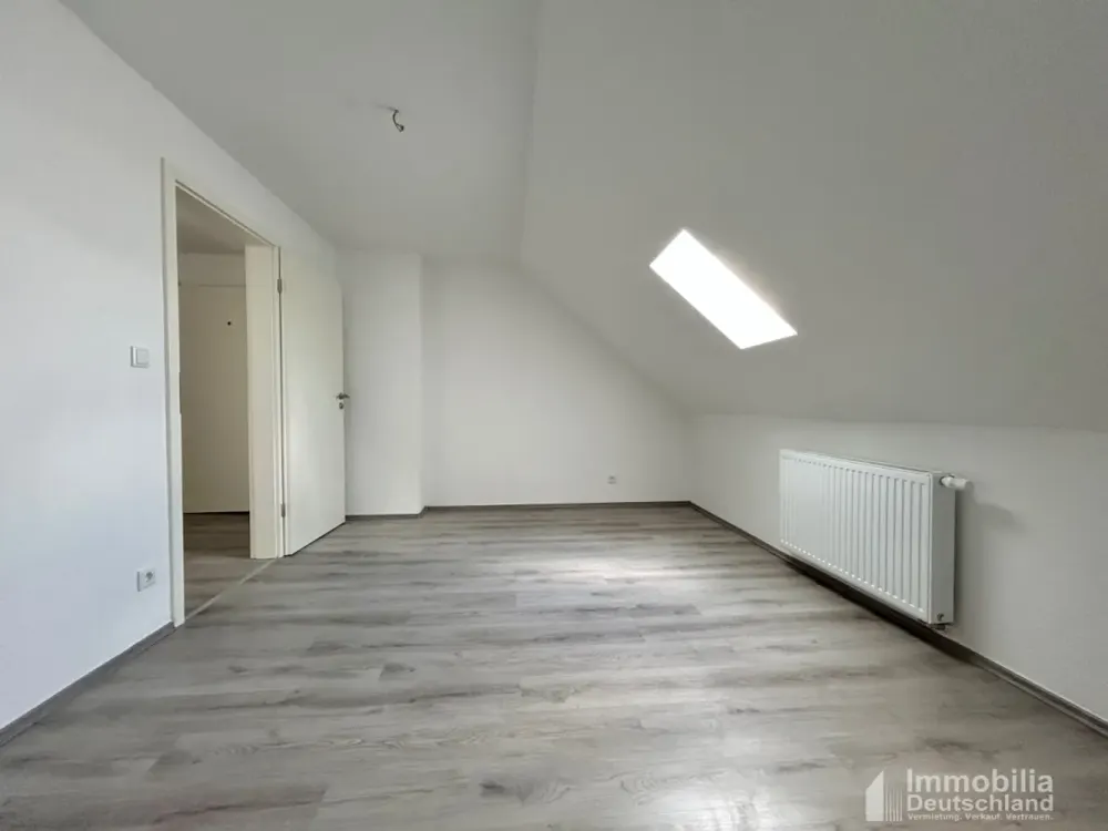 Erstbezug: Moderne 2-Zimmer-Dachgeschosswohnung mit offener Küche