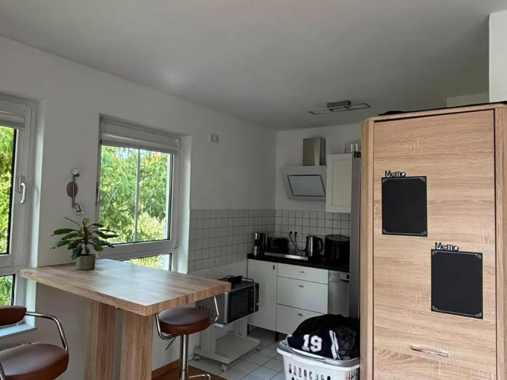 Moderne 1-Raum-Wohnung mit Balkon, Aufzug & Tiefgaragenstellplatz