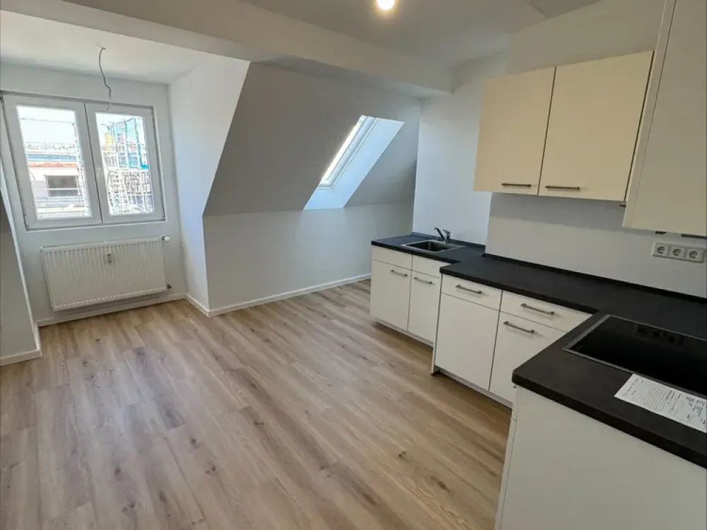 Exklusive 4-Zimmer-Dachgeschosswohnung mit Terrasse, Erstbezug nach Ausbau im Herzen des Prenzlauer