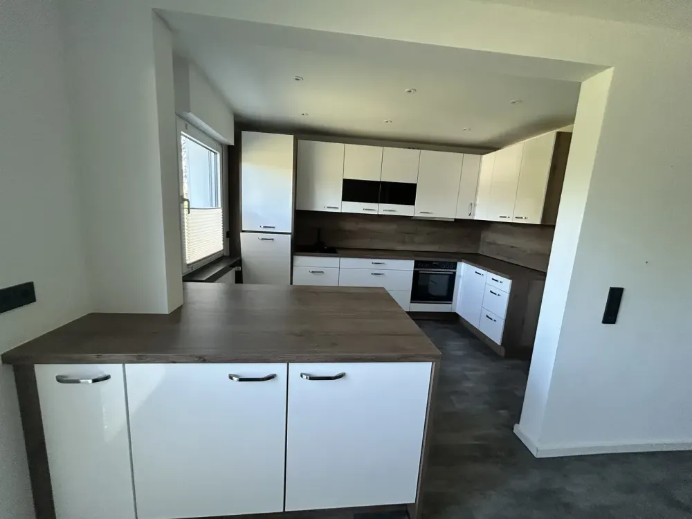 Stilvolle 3-Zimmer-Wohnung mit Gartenanteil, Erstbezug nach Kernsanierung