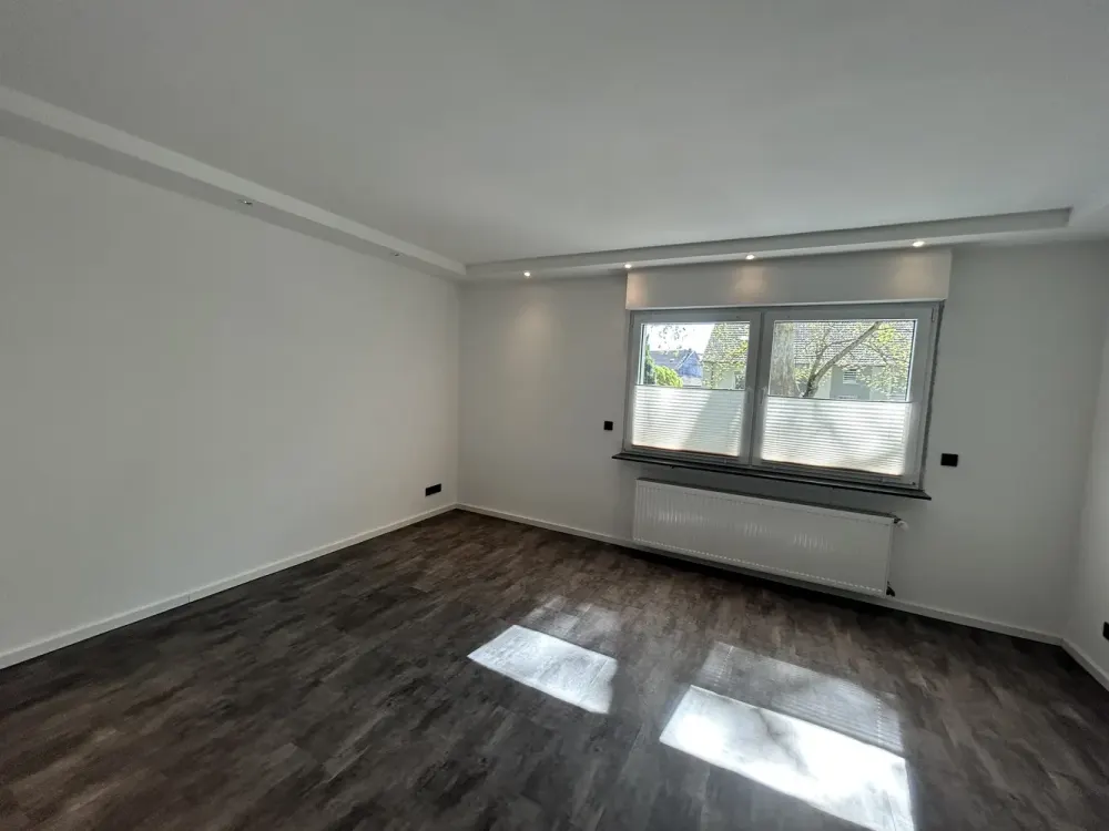 Stilvolle 3-Zimmer-Wohnung mit Gartenanteil, Erstbezug nach Kernsanierung